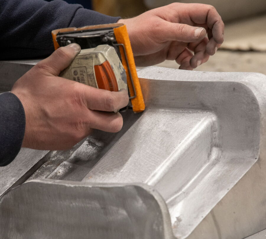 Manual polishing by skilled technicians for detailed moulds